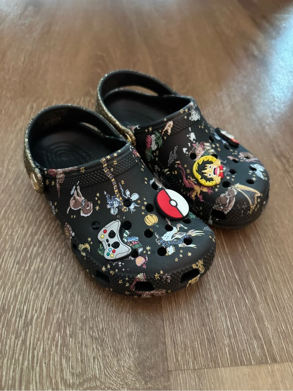 CROCS Black Glitter-Trim Character Print Clogs